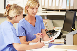 Allied Healthcare Professional and General Liability Nurses with Paperwork