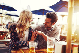 Bar and Restaurant Couple at Restaurant Table Outside